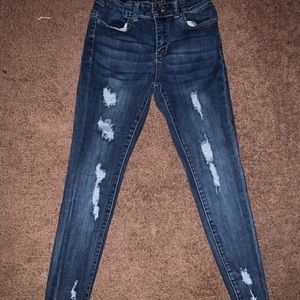 Dark blue ripped jeans